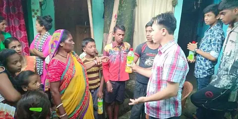 Distribution Juice Bottles to Slum peoples